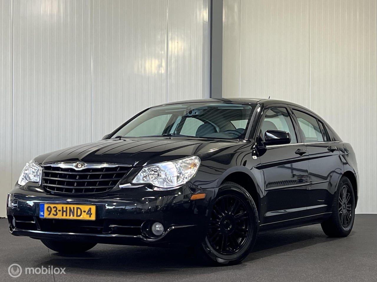 Chrysler Sebring - 2.0 Touring [ NAP trekhaak cruise ] - AutoWereld.nl