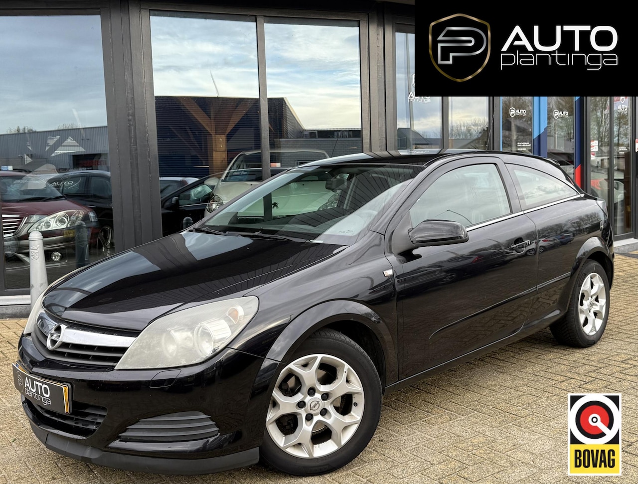 Opel Astra GTC - 1.4 Cosmo 90PK | NL AUTO | Airco | Trekhaak | - AutoWereld.nl