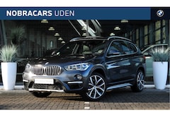 BMW X1 - sDrive20i High Executive xLine Automaat / Panoramadak / Trekhaak / Sportstoelen / Achterui