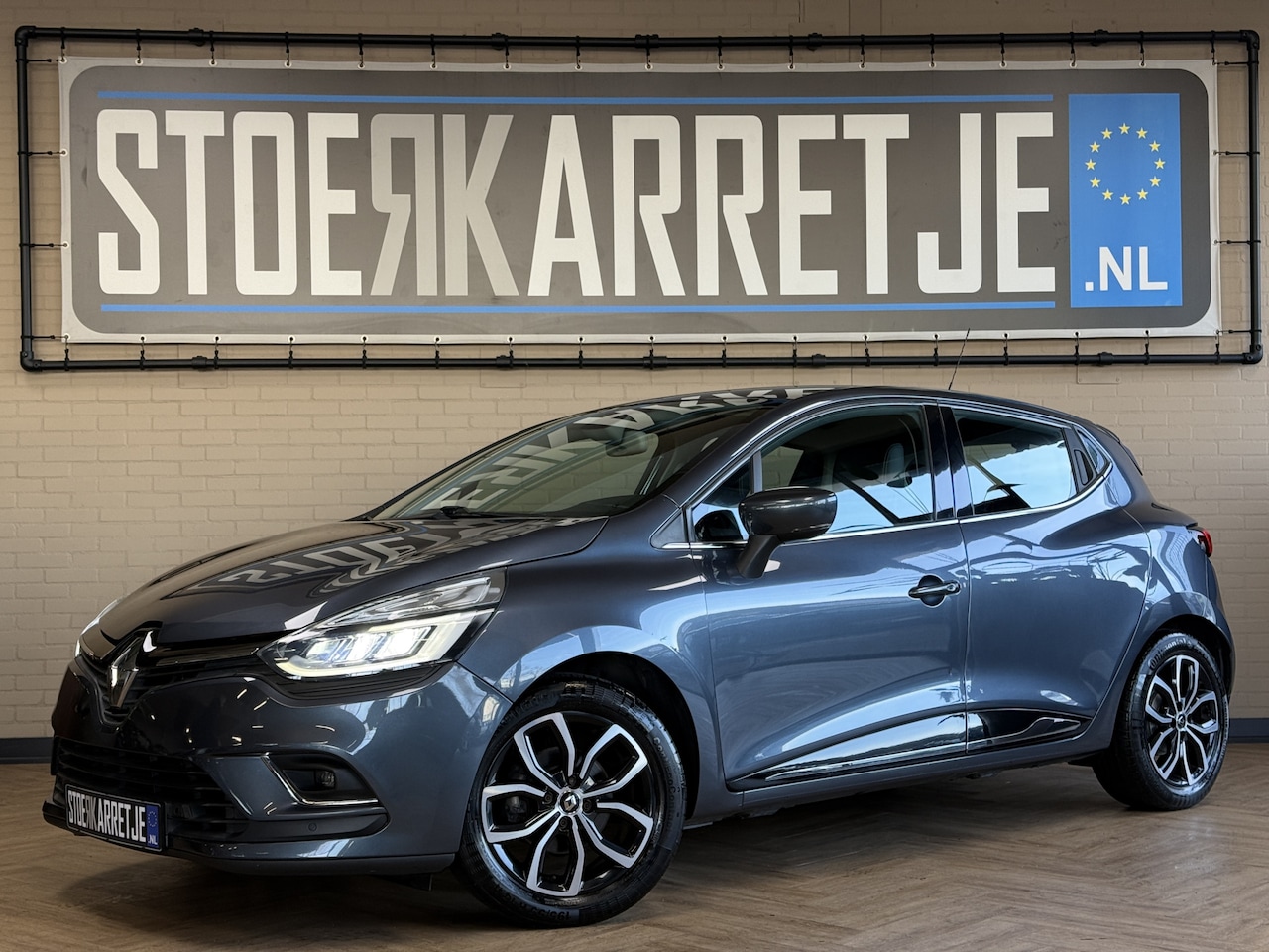 Renault Clio - 0.9 TCe 90pk | Intens | Navi | Led | Keyless | PDC | Camera | 16" | Stoelverwarming | Keur - AutoWereld.nl
