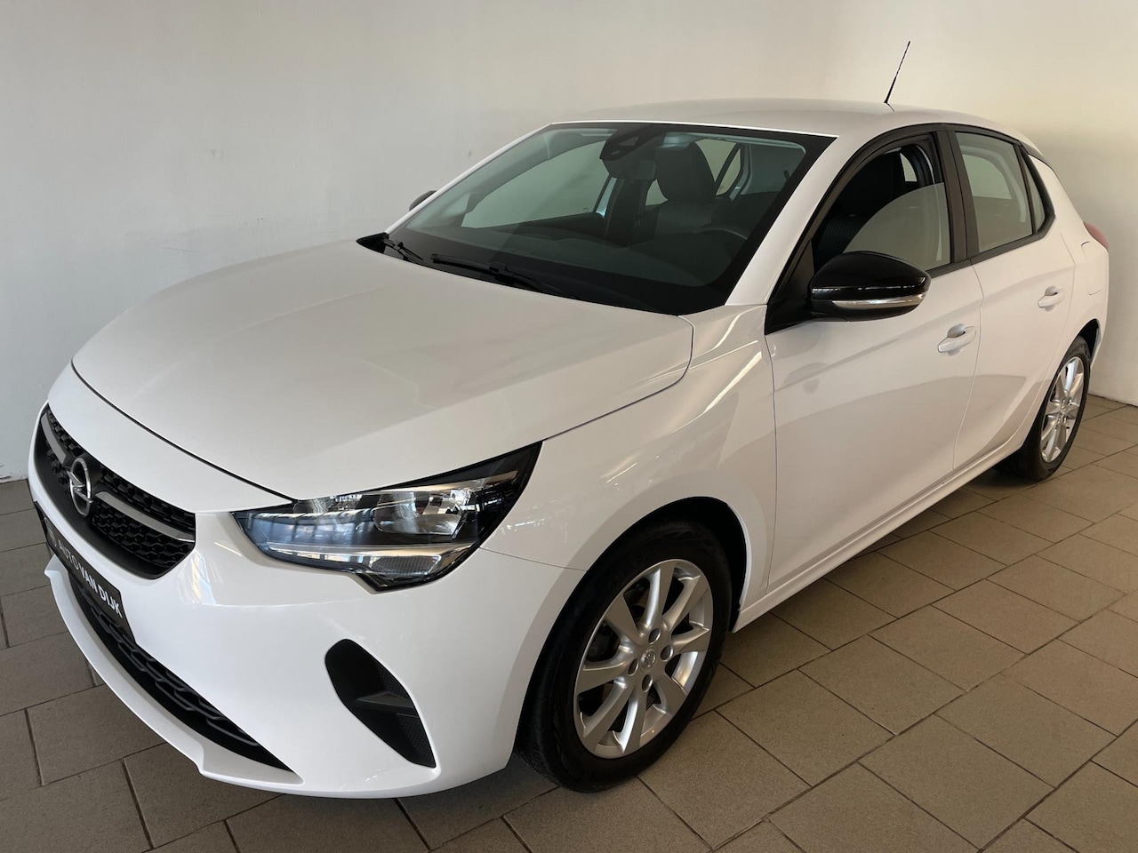 Opel Corsa - 1.2 Edition AIRCO NAVI CRUISE STUURVERW PDC BLUETOOTH VELGEN ELEK RAMEN CENT VERG NIEUWSTA - AutoWereld.nl