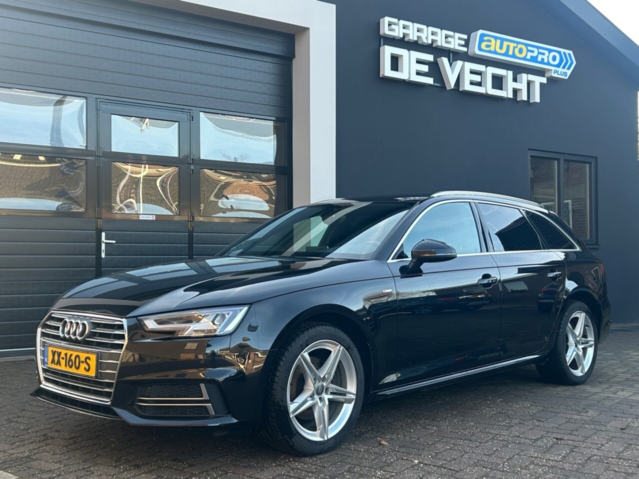 Audi A4 Avant - 1.4 TFSI Sport 2x S line black edition - AutoWereld.nl