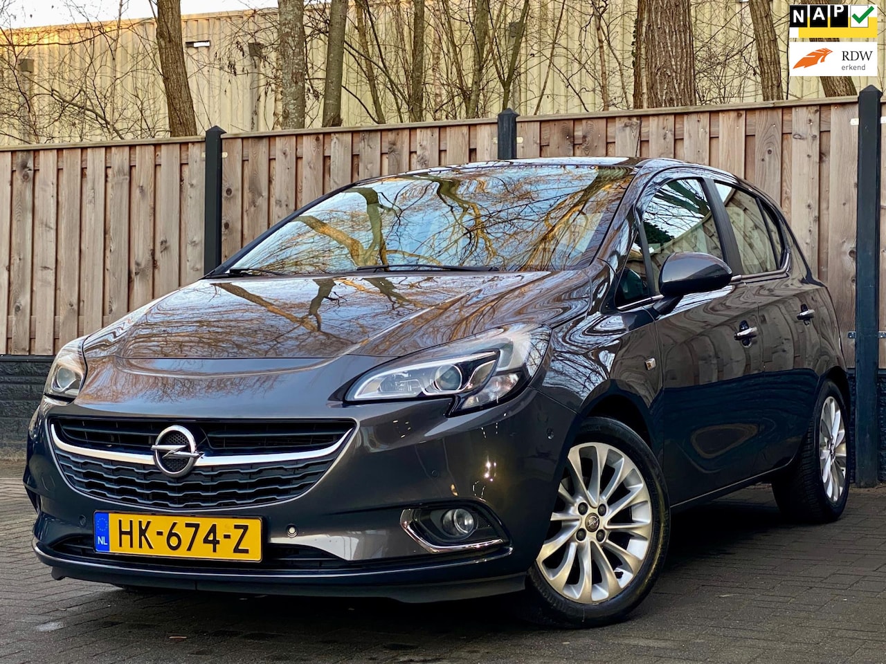Opel Corsa - 1.4 Cosmo nov-15, 103.962 km NL AUTO I AUTOMAAT I CAMERA I APK I NAVI - AutoWereld.nl