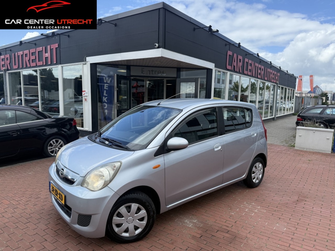 Daihatsu Cuore - 1.0 Premium 5drs airco cd stuurbekrachtiging - AutoWereld.nl