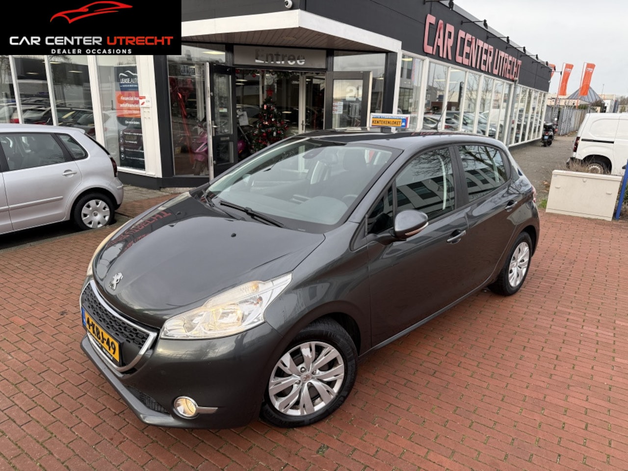 Peugeot 208 - 1.2 VTi Envy navi airco cruise control - AutoWereld.nl