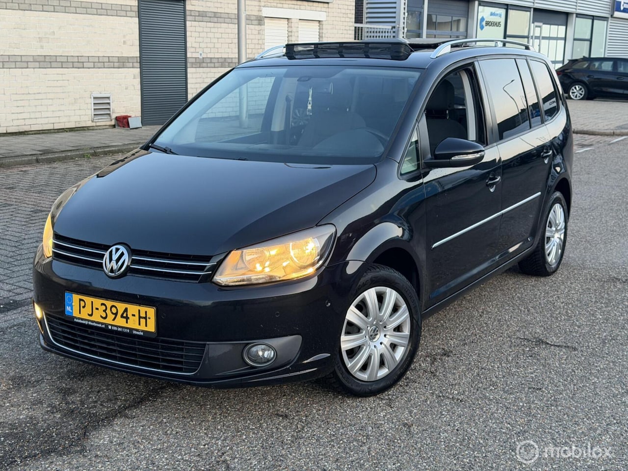 Volkswagen Touran - 1.6 TDI 7 persoon. Panoramadak - AutoWereld.nl