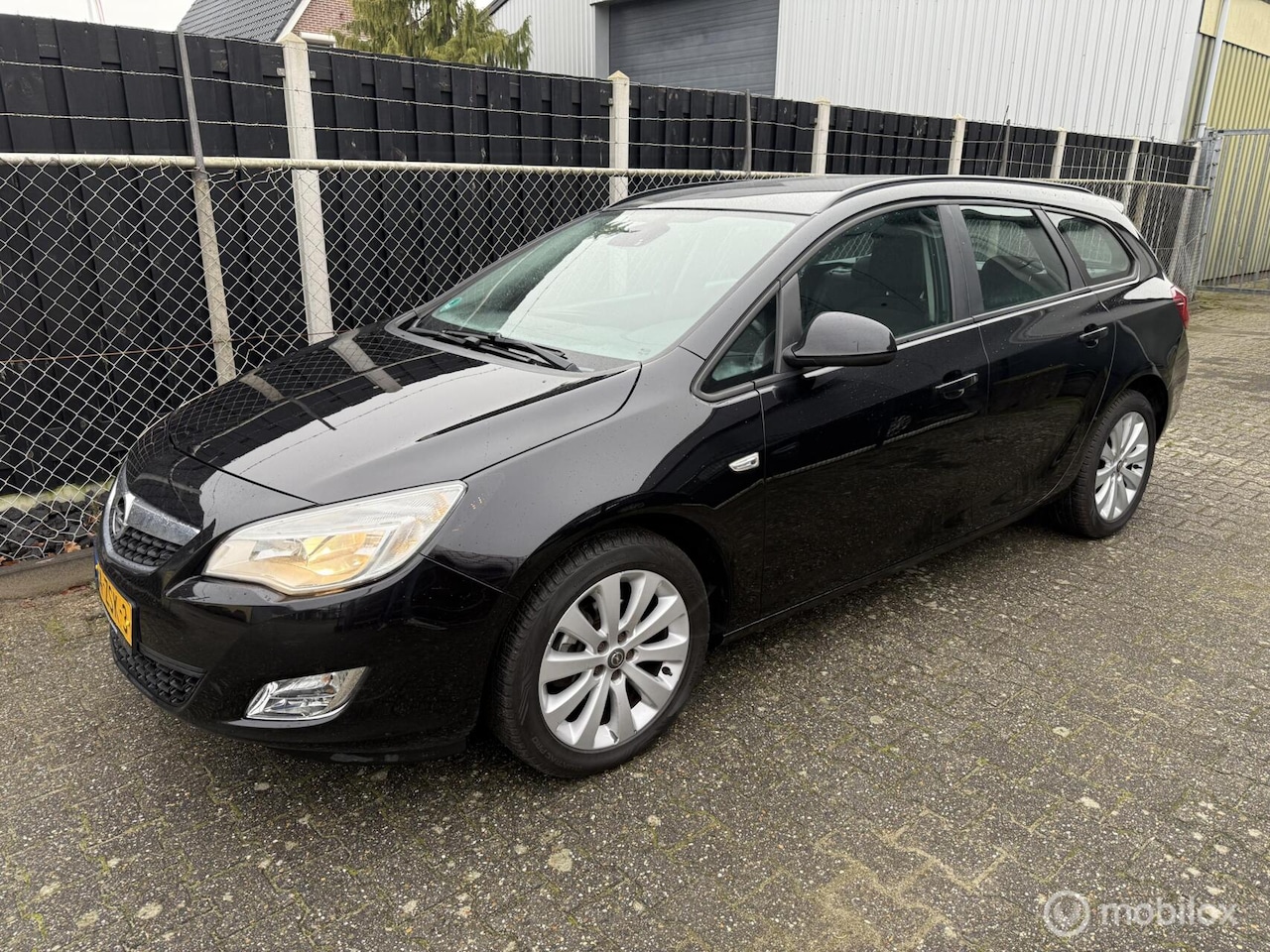 Opel Astra Sports Tourer - 1.4 Turbo Cosmo export - AutoWereld.nl