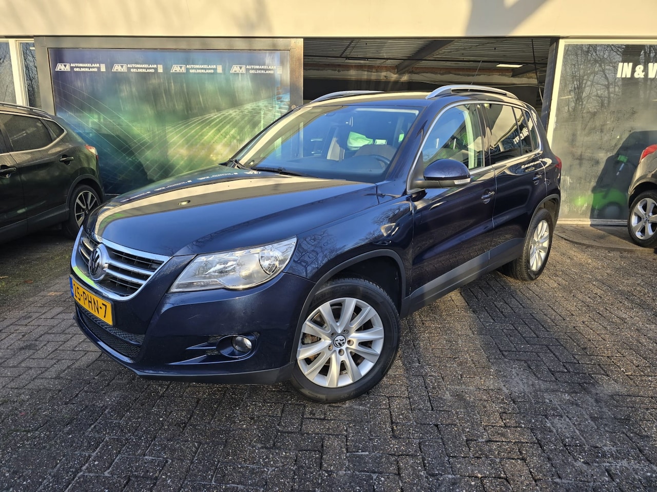 Volkswagen Tiguan - 1.4 TSI Sport&Style | 12MND GARANTIE | PANO DAK | CRUISE | TREKHAAK | - AutoWereld.nl