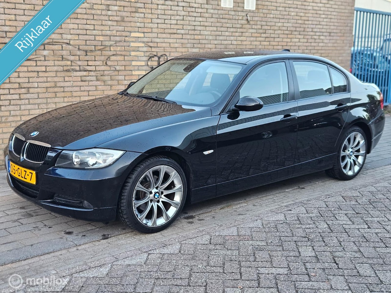 BMW 3-serie - 320i Business Line | APK | NAP | Airco |NAVI | - AutoWereld.nl