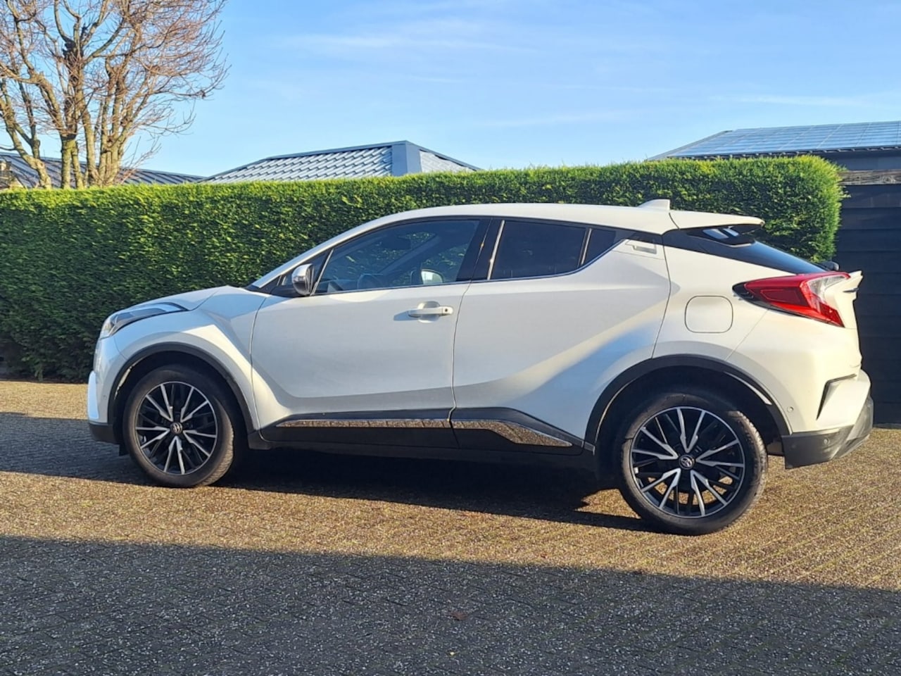 Toyota C-HR - Executive limited edition Parelmoer wit - AutoWereld.nl