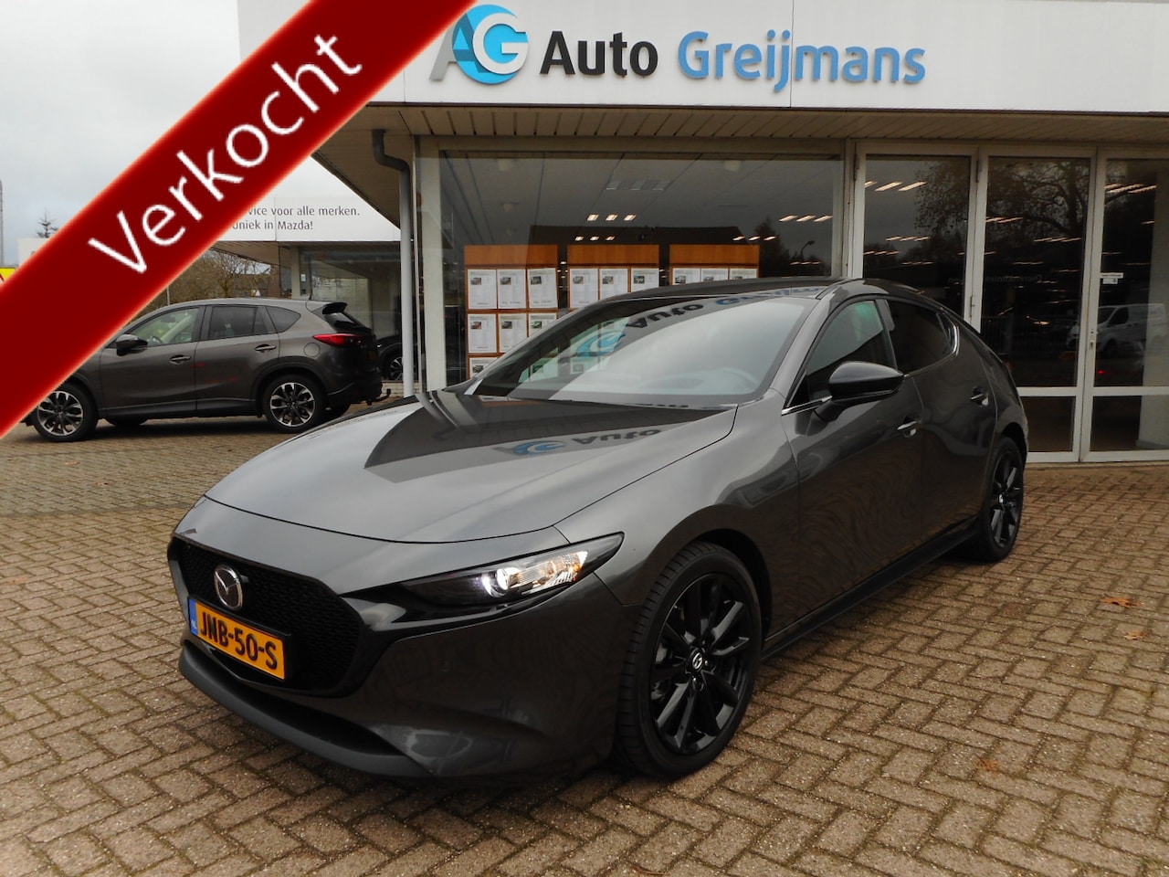 Mazda 3 - 2.5 e-SkyActiv-G M Hybrid 140 Nagisa 2.5 e-SkyActiv-G M Hybrid 140 Nagisa - AutoWereld.nl