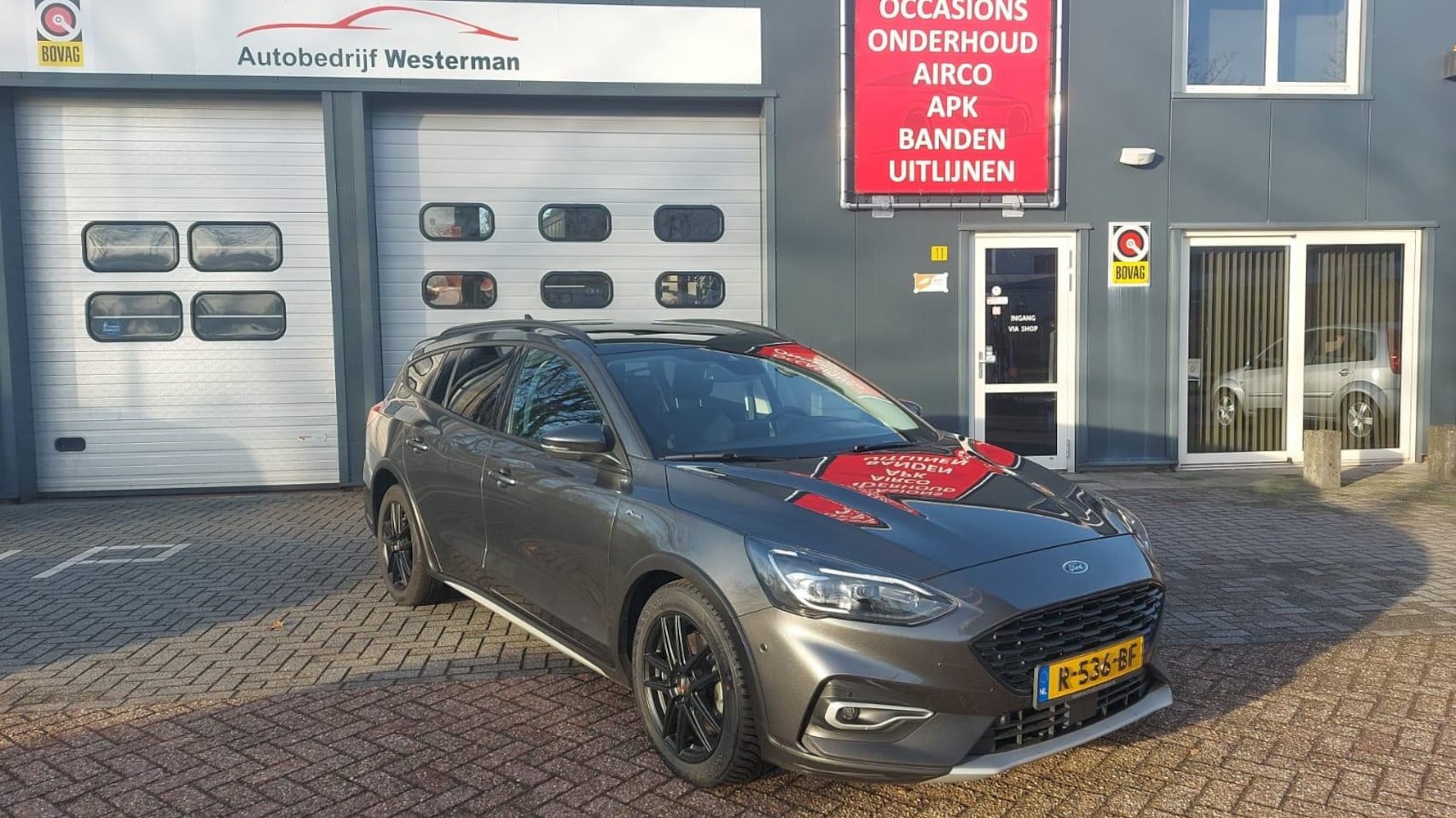 Ford Focus Wagon - 1.0 EcoBoost Vignale B&O / Pano / 125pk / automaat - AutoWereld.nl