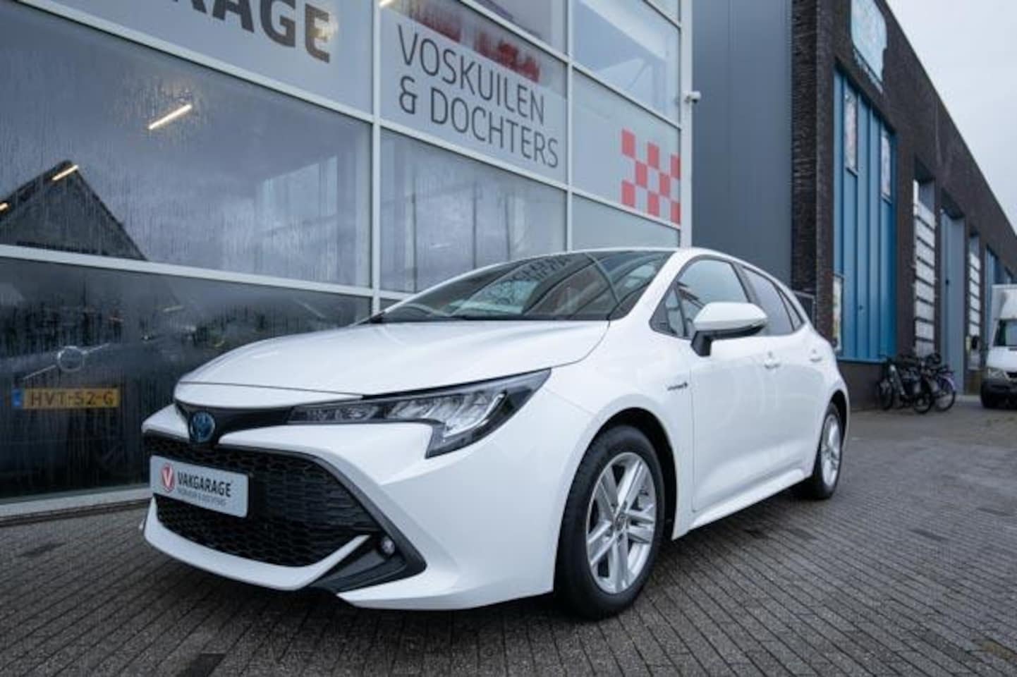Toyota Corolla - 1.8 Hybrid Dynamic | Stoelverwarming | Carplay - AutoWereld.nl