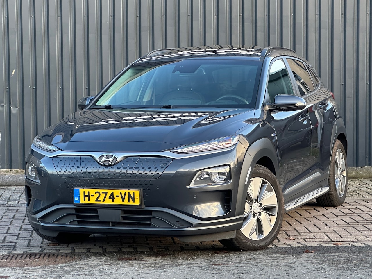 Hyundai Kona Electric - EV Premium 64 kWh SOH 100%|TREKHAAK - AutoWereld.nl
