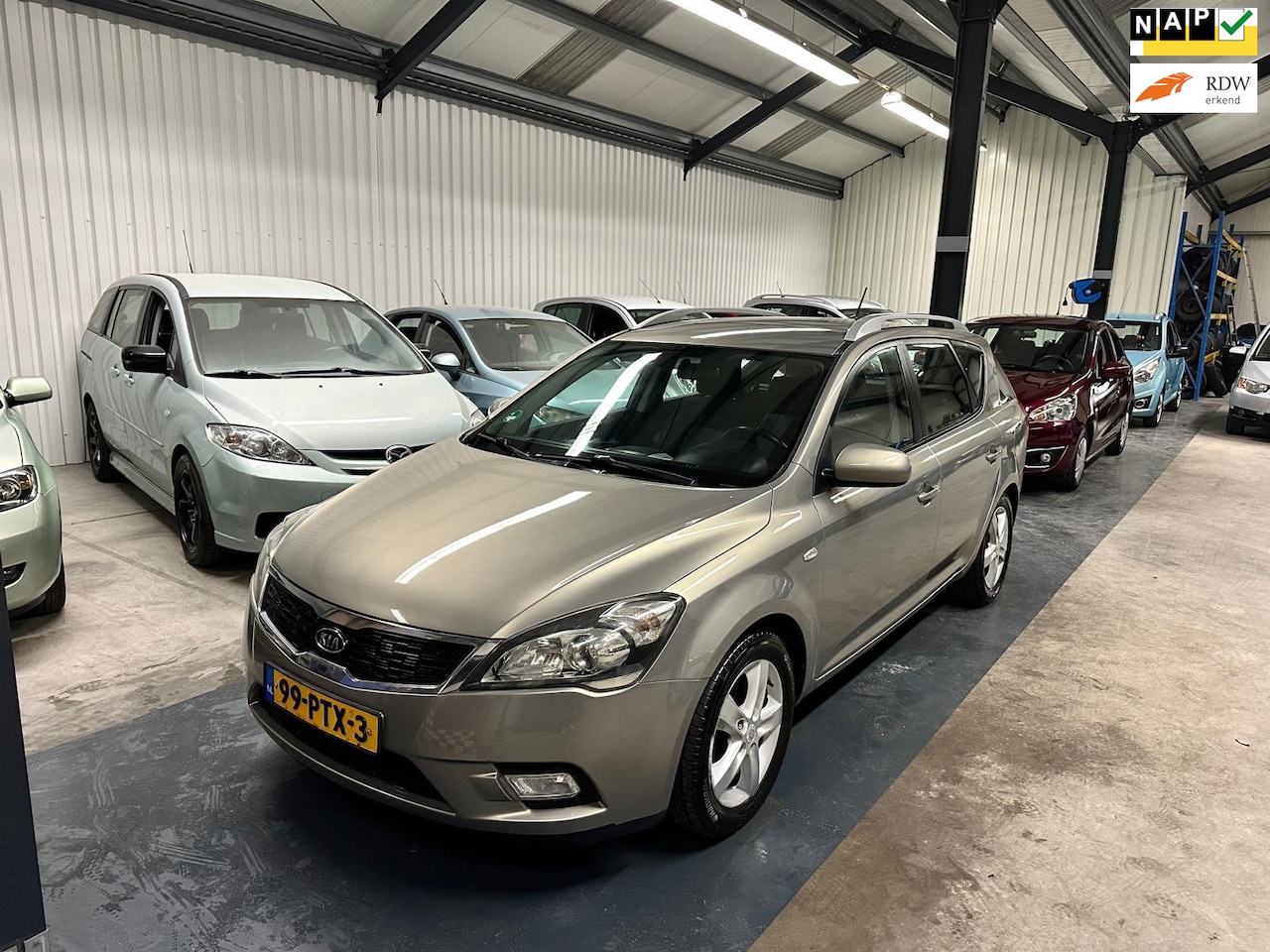 Kia Cee'd Sporty Wagon - 1.4 CVVT Seven 1.4 CVVT Seven - AutoWereld.nl