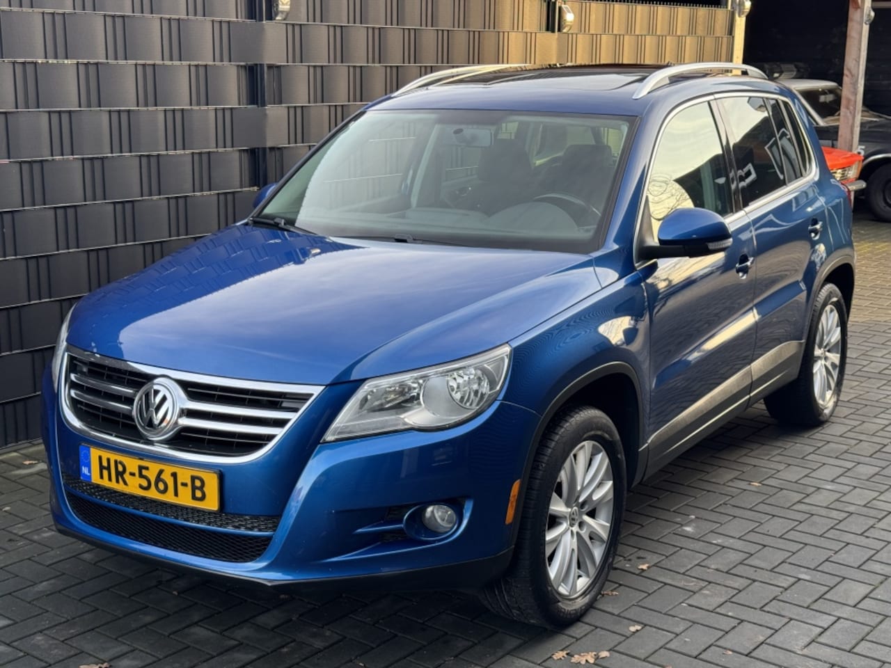 Volkswagen Tiguan - 2.0TSI Sport&Style| 4MOTION| AUTOMAAT| PANO| AIRCO - AutoWereld.nl