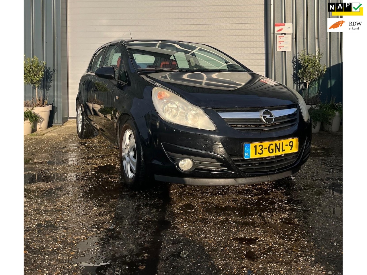 Opel Corsa - 1.4-16V Enjoy - Airco - AutoWereld.nl