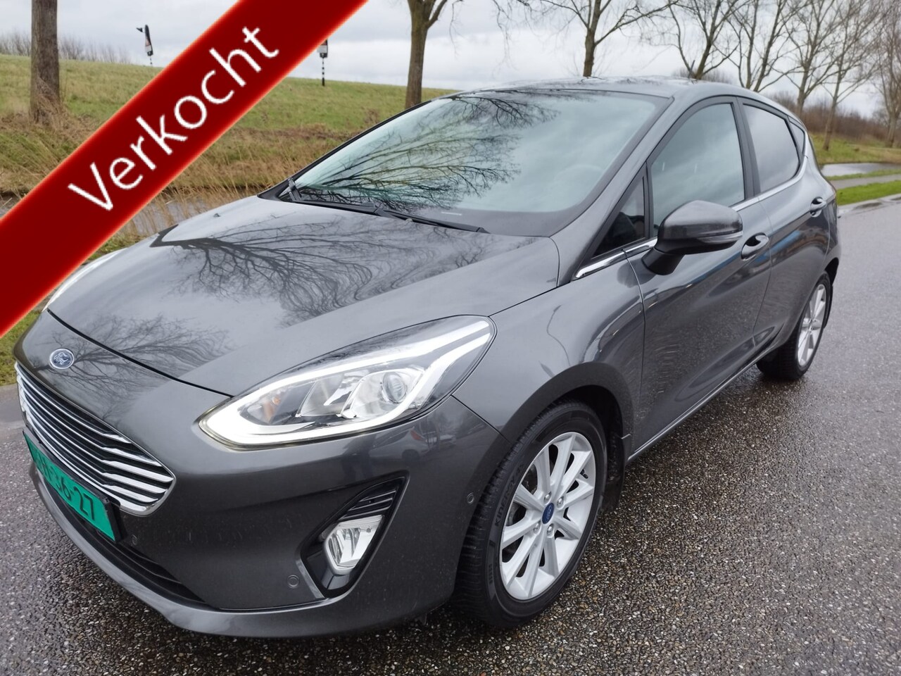 Ford Fiesta - 1.0 EcoBoost ** 125 pk ** Titanium ** NAVI ** B & O Sound ** Camera ** Parkeerpakket ** - AutoWereld.nl