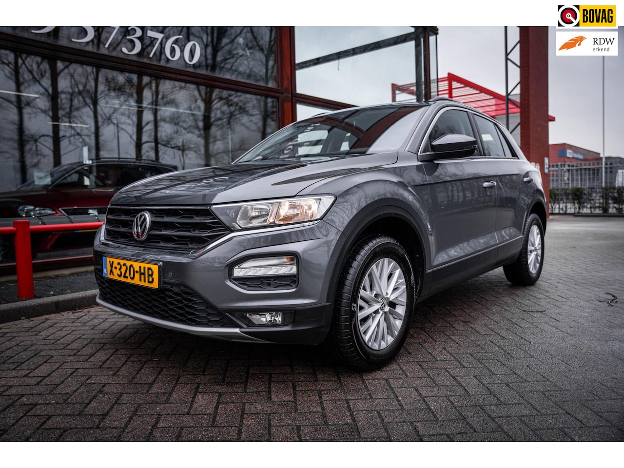 Volkswagen T-Roc - 1.5 TSI Sport | Automaat | Camera | Stoel verwarming | Car-play | Adaptieve cruise control - AutoWereld.nl