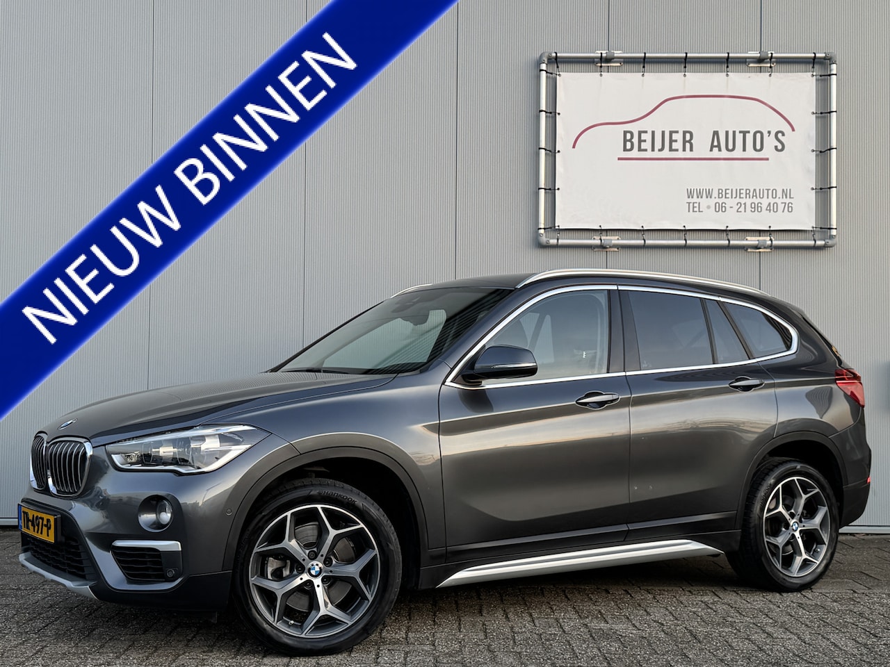 BMW X1 - sDrive20i Orange Edition II Automaat Navigatie/Camera/Leer. - AutoWereld.nl