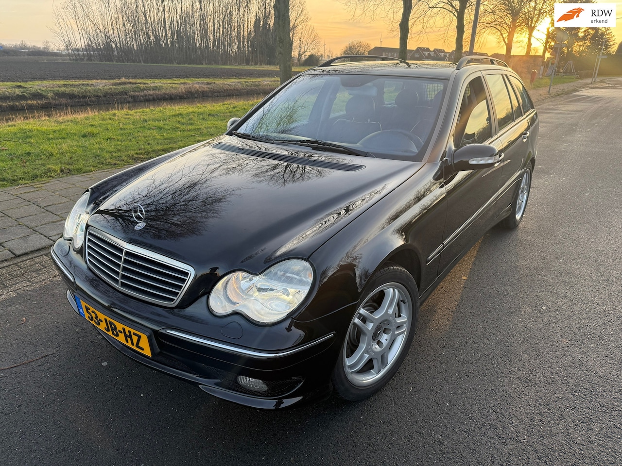 Mercedes-Benz C-klasse Combi - AMG 32 AUTOMAAT/LEER/NAVI/CRUISE - AutoWereld.nl