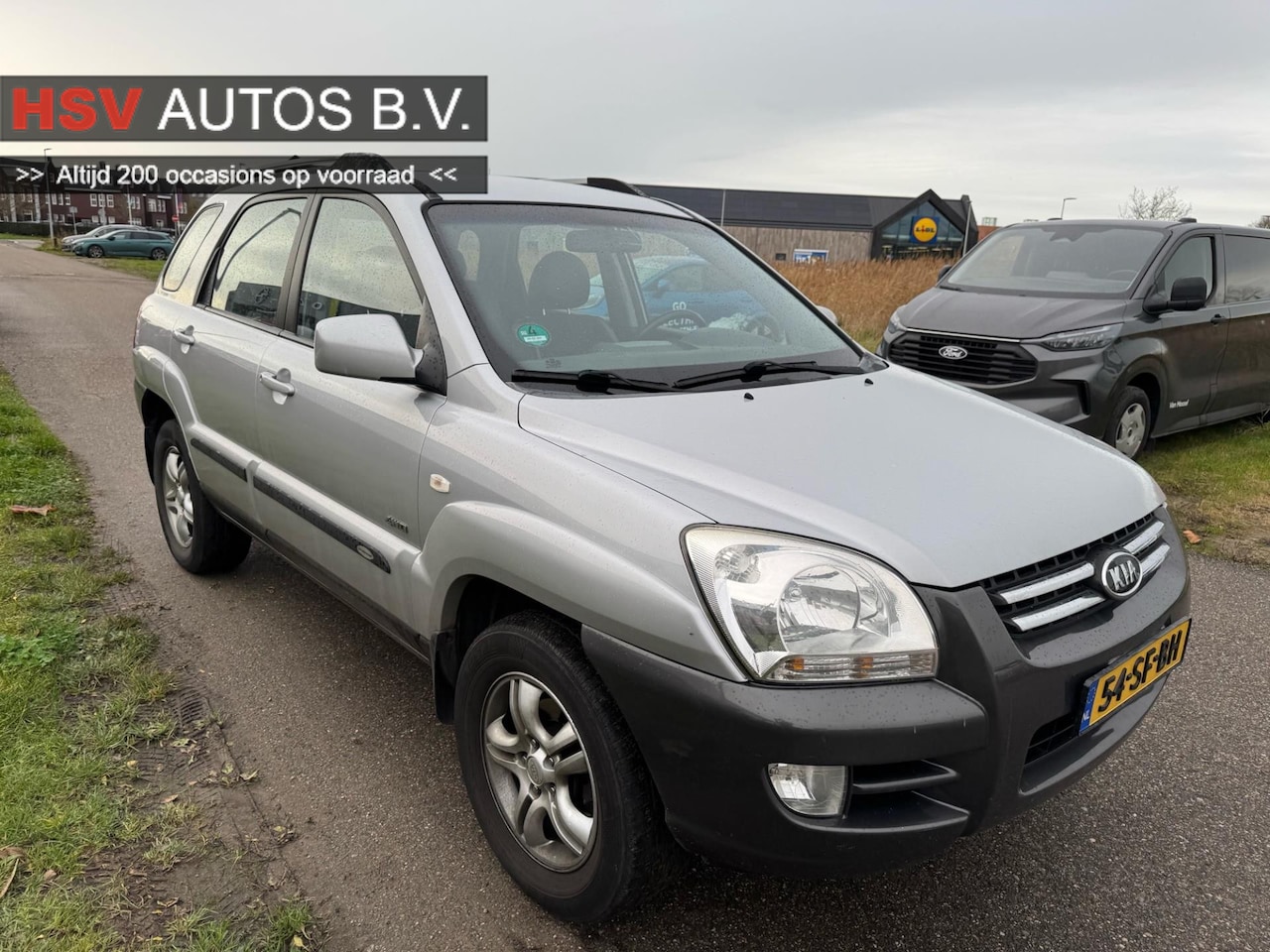 Kia Sportage - 2.0 CVVT Adventure 4WD airco LM trekhaak - AutoWereld.nl