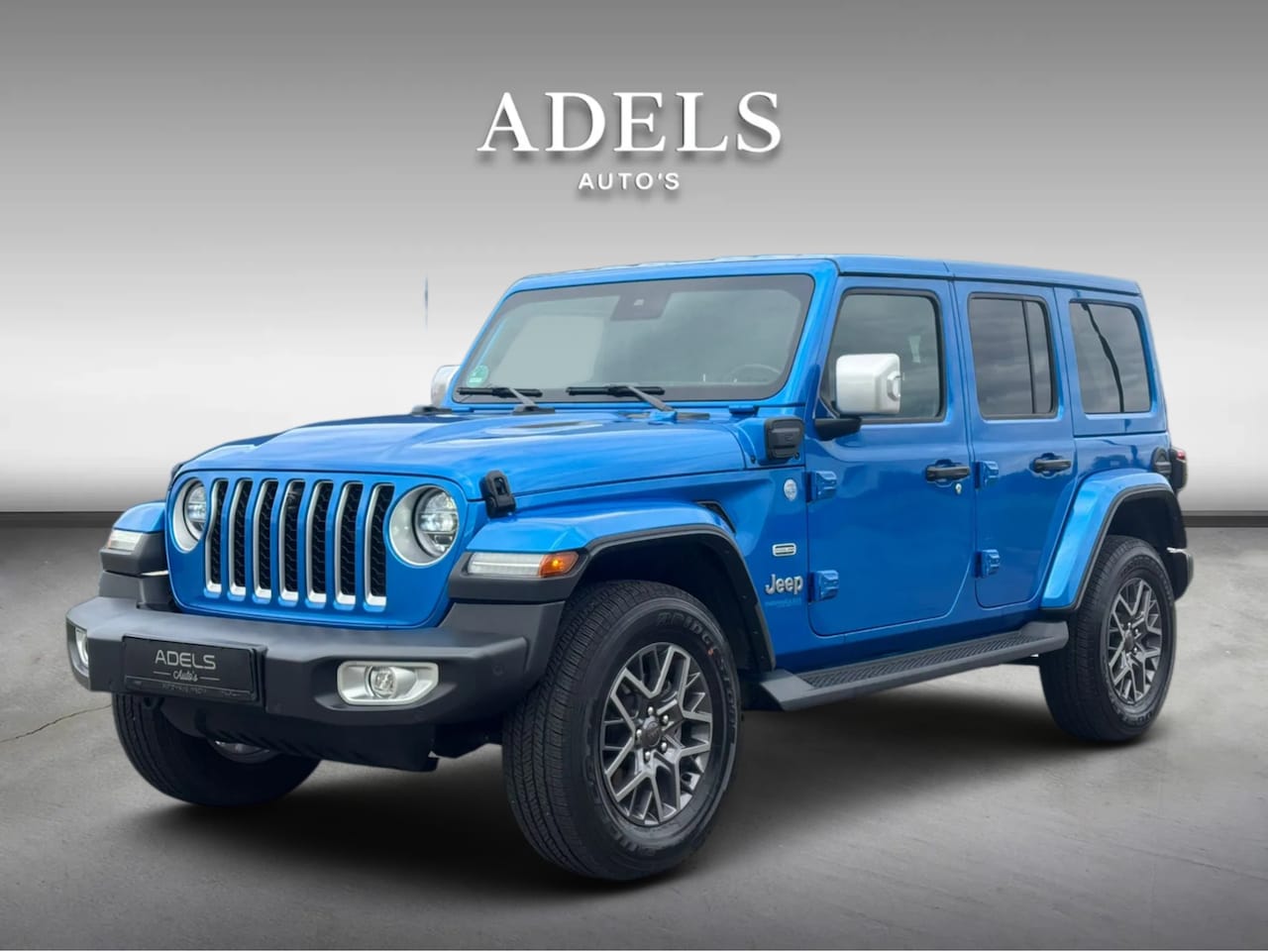 Jeep Wrangler Unlimited - 4xe 380 Sahara Camera Leder Keyless Alpine Dealer Onderhouden - AutoWereld.nl