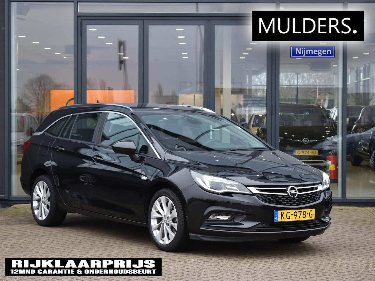 Opel Astra Sports Tourer - 1.4 Edition | Airco / Cruise / LMV - AutoWereld.nl