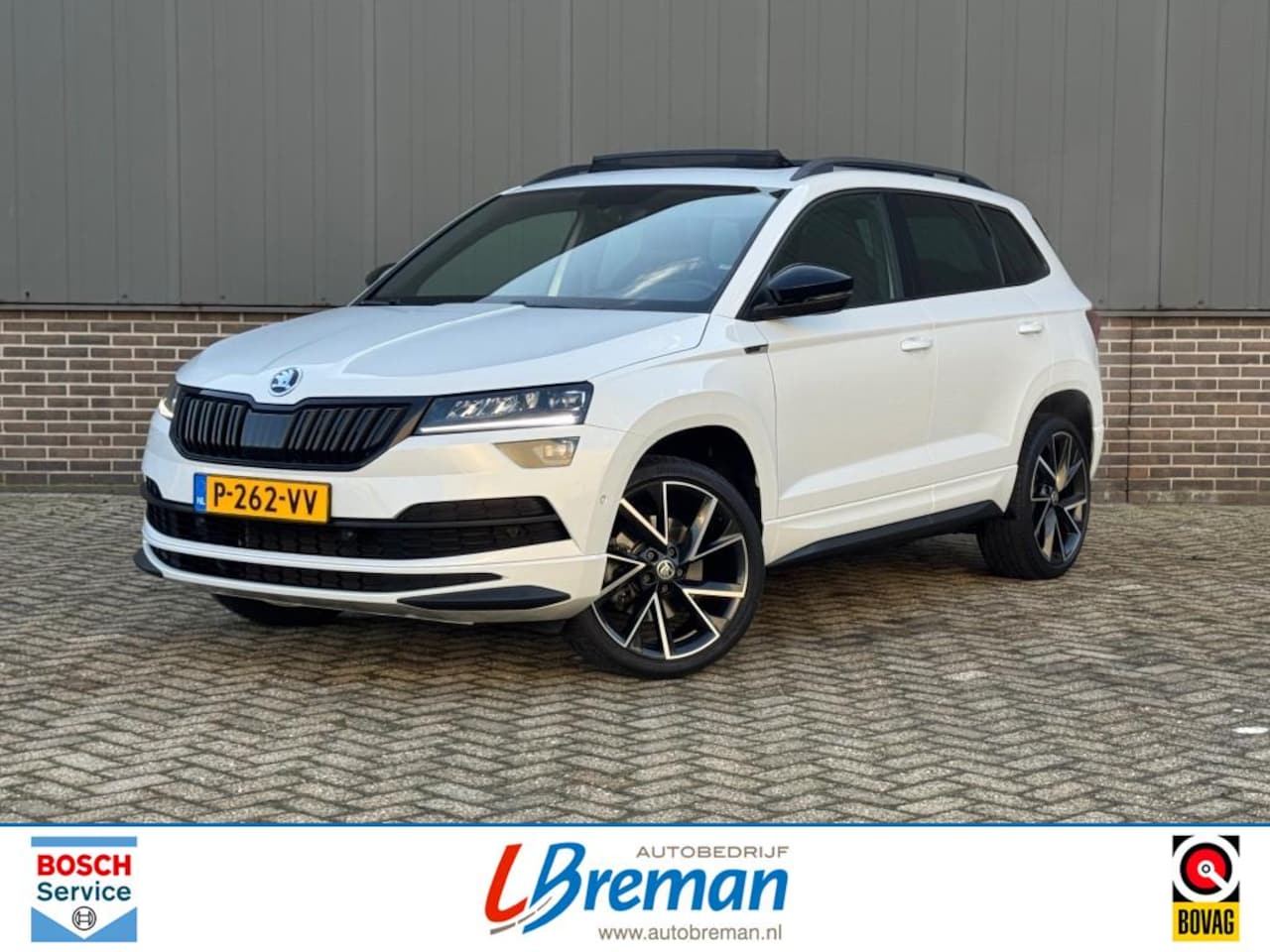 Skoda Karoq - 1.5 TSI ACT SPORTLINE BUSINESS DSG Panodak trekhaak - AutoWereld.nl