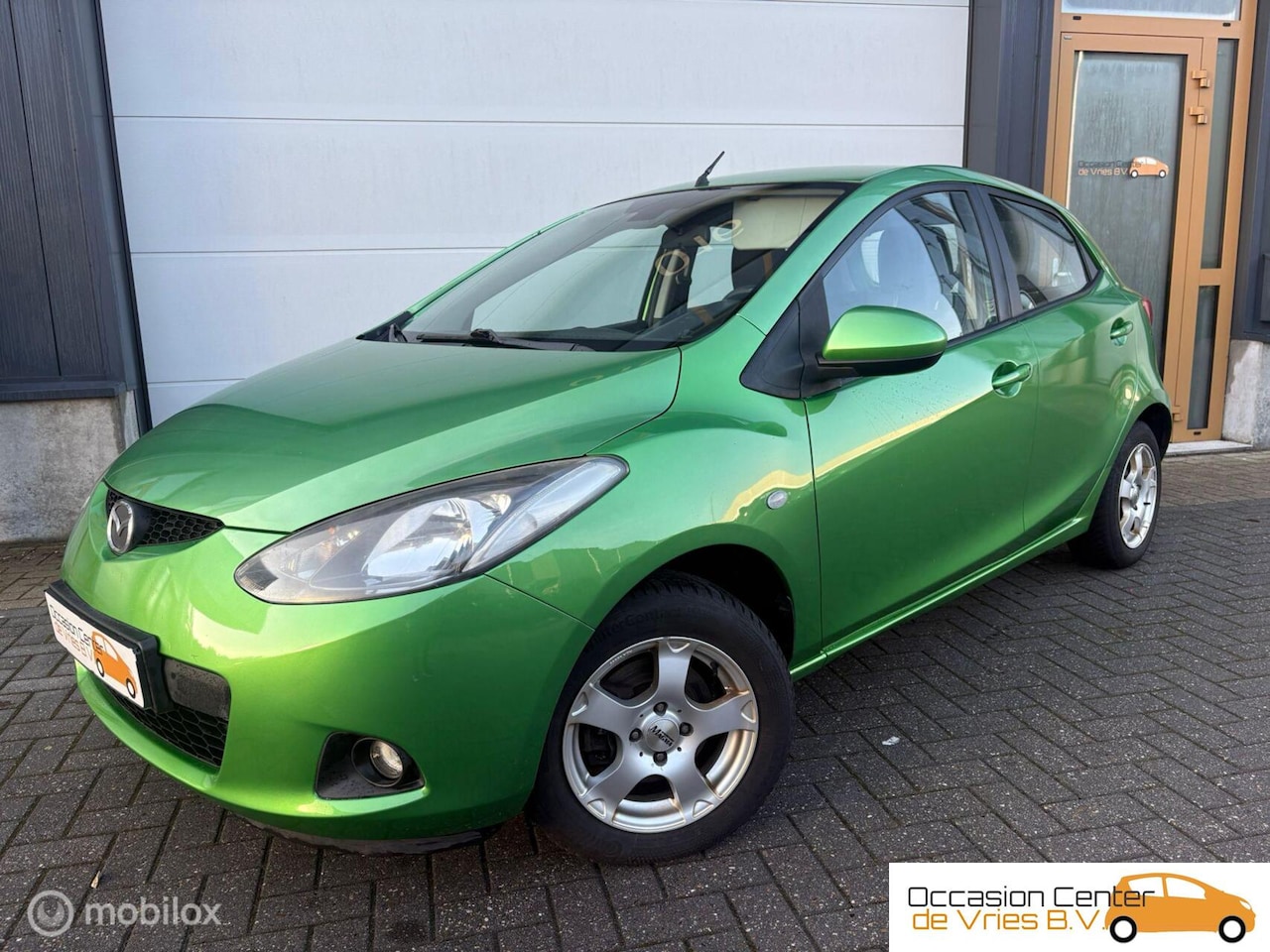 Mazda 2 - 1.3 Airco Velgen Navi/Carplay Bluetooth ElektrPakket - AutoWereld.nl