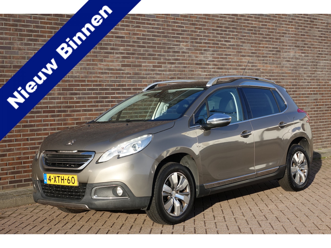 Peugeot 2008 - 1.2 PureTech Allure 1.2 PureTech Allure, Panoramadak, leder/stof, navigatie, PDC - AutoWereld.nl