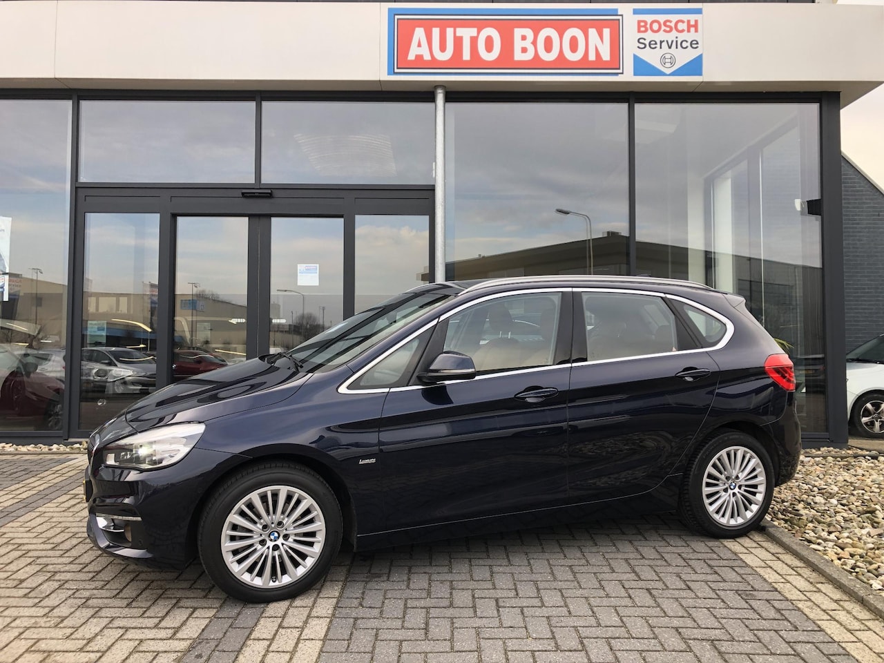 BMW 2-serie Active Tourer - 218i 136PK AUTOM. H.E. : LEER/PANO/HUD NAVI/LED/KEYLESS/2xPDC/ - 2E.EIG - NL AUTO - KM=NAP - AutoWereld.nl