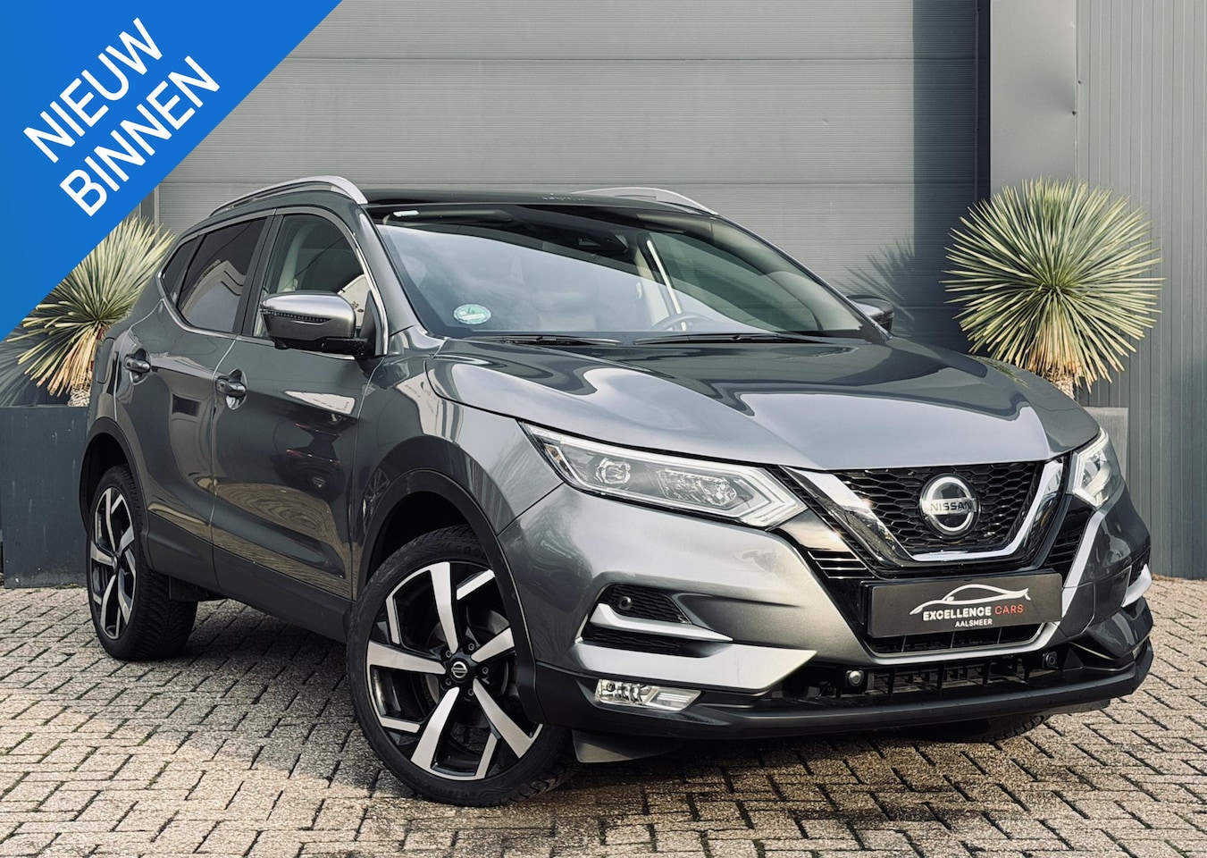 Nissan Qashqai - 1.3 DIG-T Tekna + Pano/Navi/Camera - AutoWereld.nl