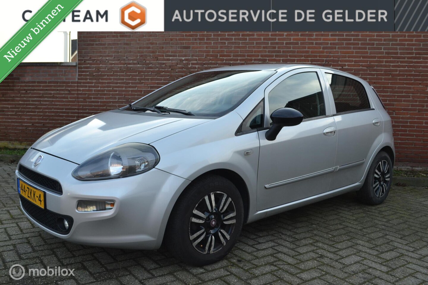 Fiat Punto Evo - 0.9 TwinAir | CarPlay | Cruise | Camera | Trekhaak | Nw. Koppeling - AutoWereld.nl
