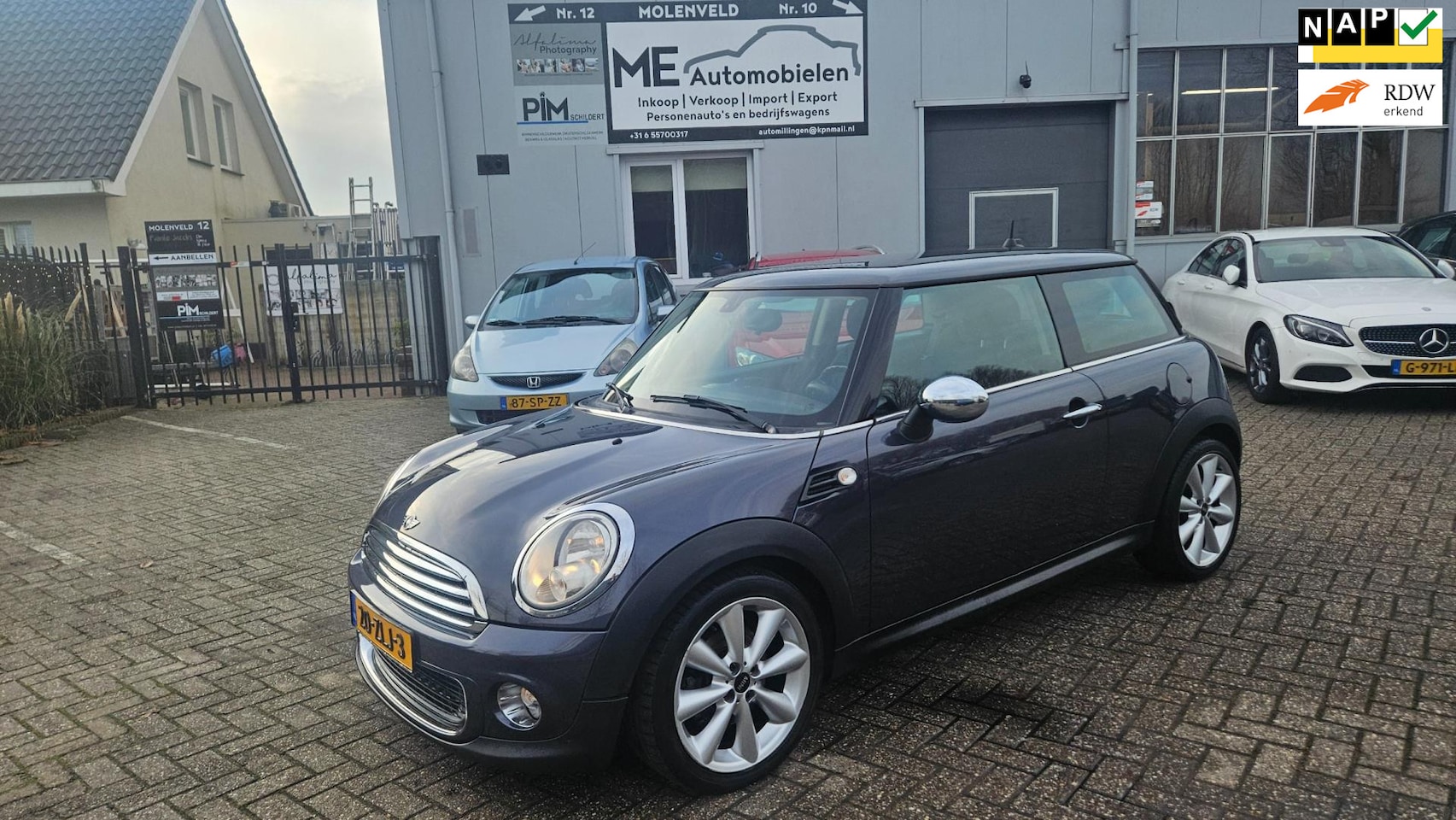 MINI One - Mini 1.6 Business Line Navi/ Dusty Grey. - AutoWereld.nl