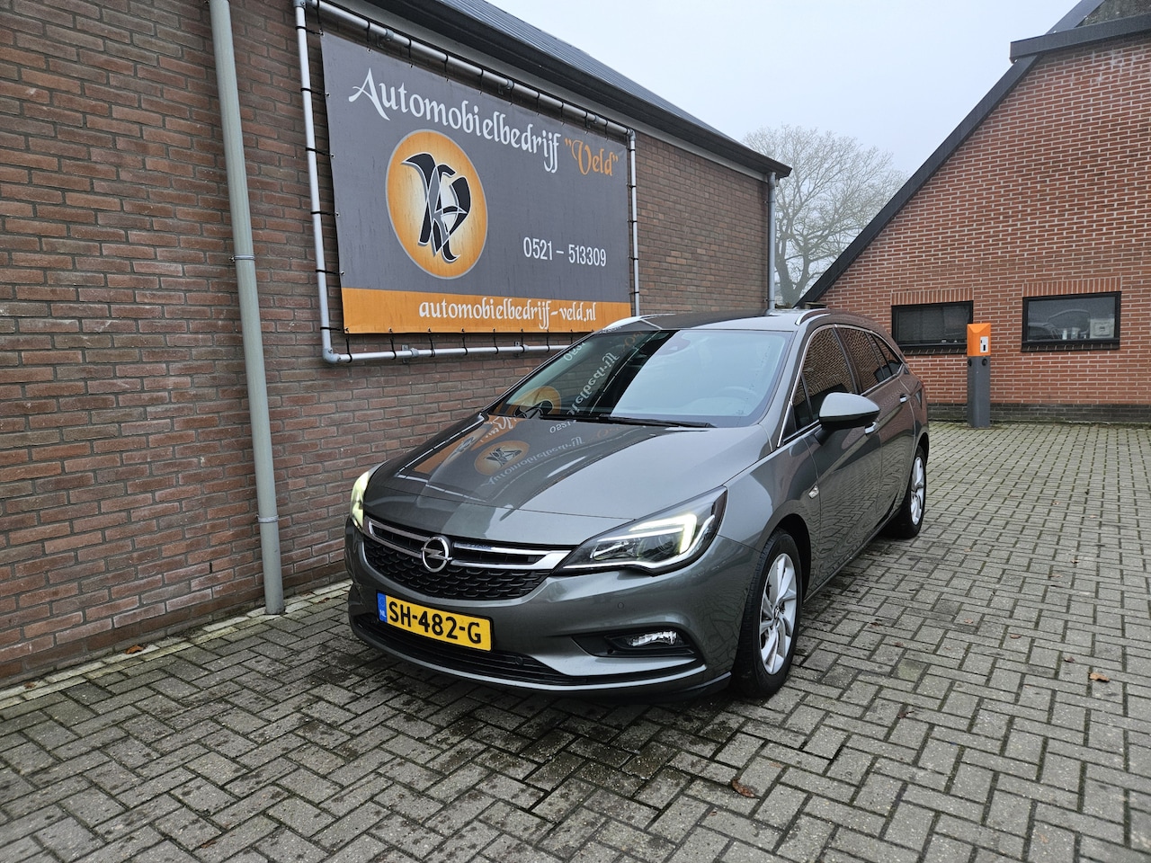 Opel Astra Sports Tourer - 1.6 CDTI Business Executive 1.6 CDTI Business Executive - AutoWereld.nl