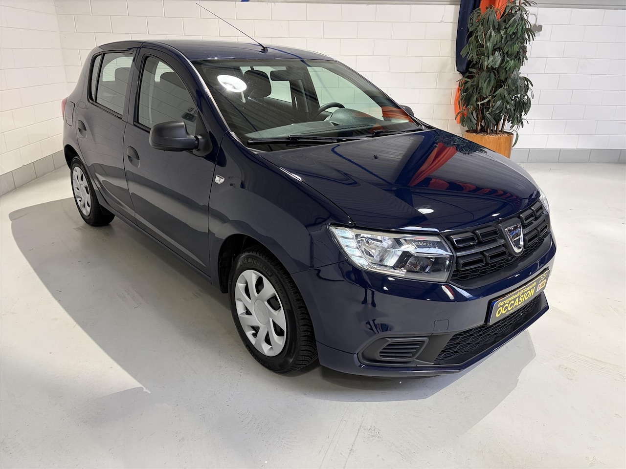 Dacia Sandero - 0.9 Tce 90pk Bi-Fuel LPG, Navigatie, trekhaak, 94dkm! - AutoWereld.nl