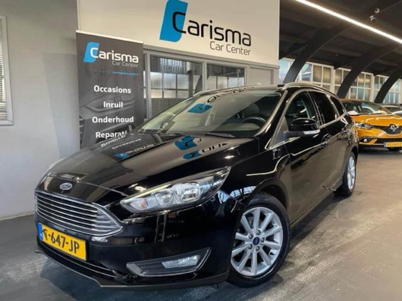 Ford Focus Wagon - 1.0 Titanium Navi|Cruise|Trekhaak - AutoWereld.nl
