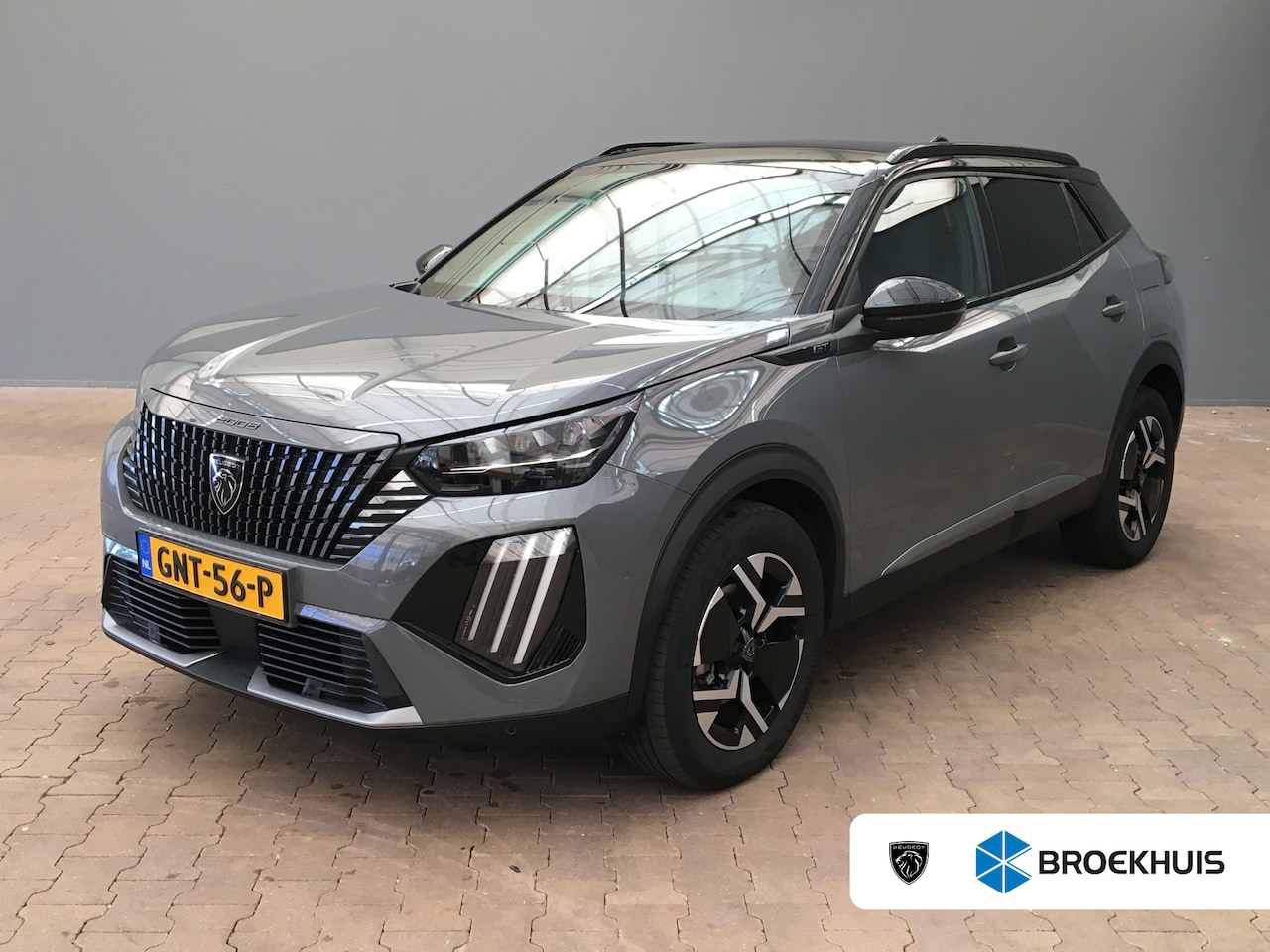 Peugeot 2008 - 1.2 Hybrid 136 GT Climate | Navigatie | Apple Carplay/Android Auto | Cruise | Apple Carpla - AutoWereld.nl