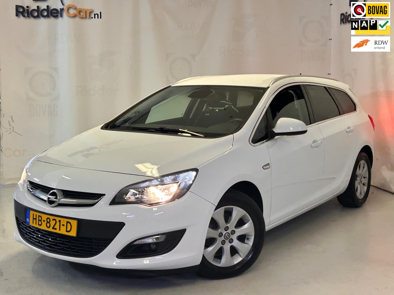 Opel Astra Sports Tourer - 1.4 Turbo Blitz|2E EIG|NAP|AIRCO|PARK SENS|CRUISE|NAVI| - AutoWereld.nl