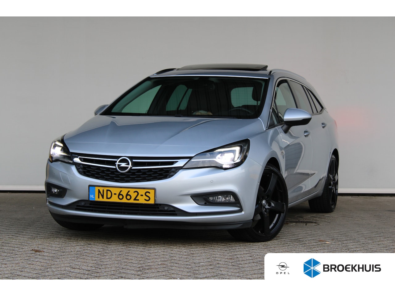 Opel Astra Sports Tourer - 1.4 Innovation | Navigatie | Camera | Lederen bekleding | Trekhaak | Schuif-/kanteldak | C - AutoWereld.nl