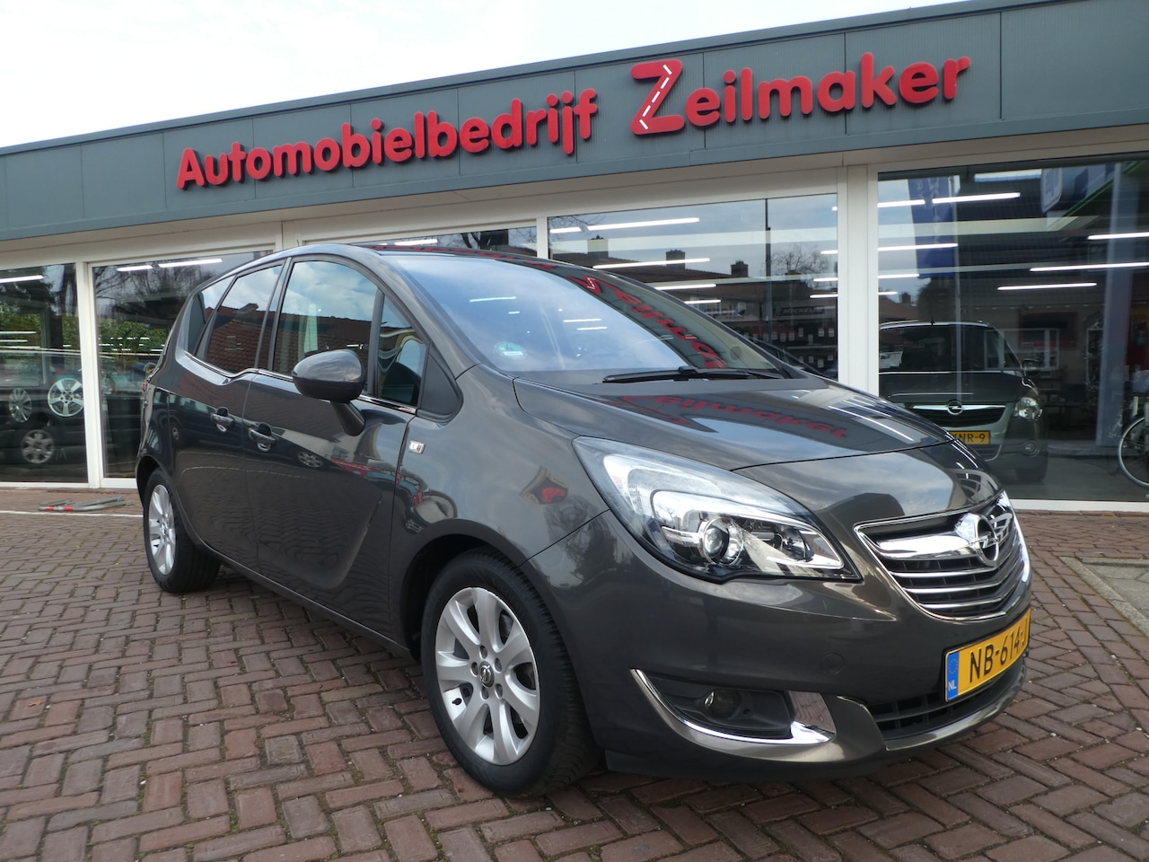 Opel Meriva - 1.4 Turbo Cosmo Airco, Navi, Allseaon banden, PDC achter, lederen bekleding - AutoWereld.nl