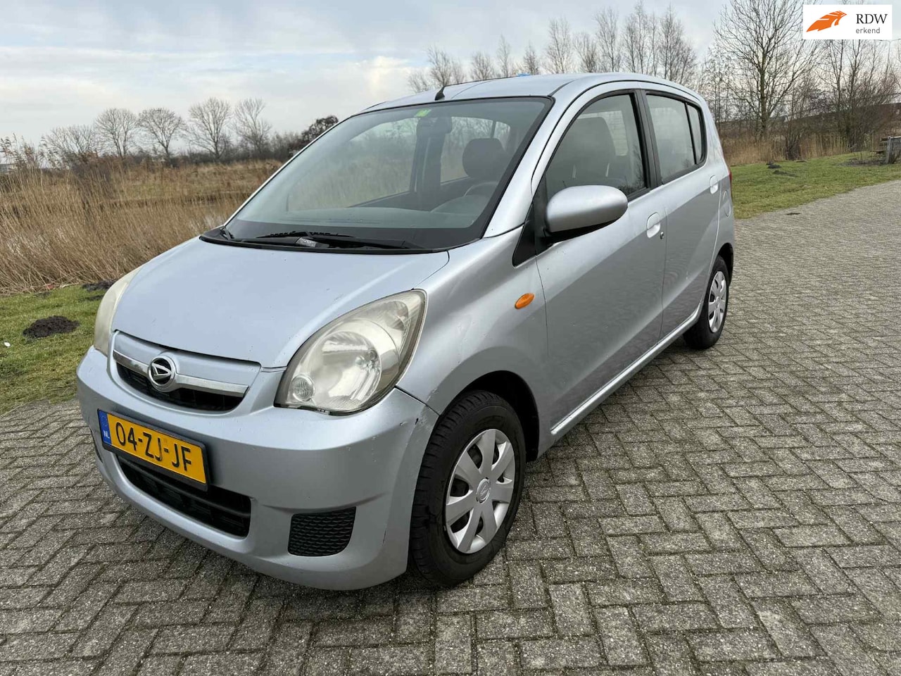 Daihatsu Cuore - 1.0 Premium inruilkoopje! - AutoWereld.nl