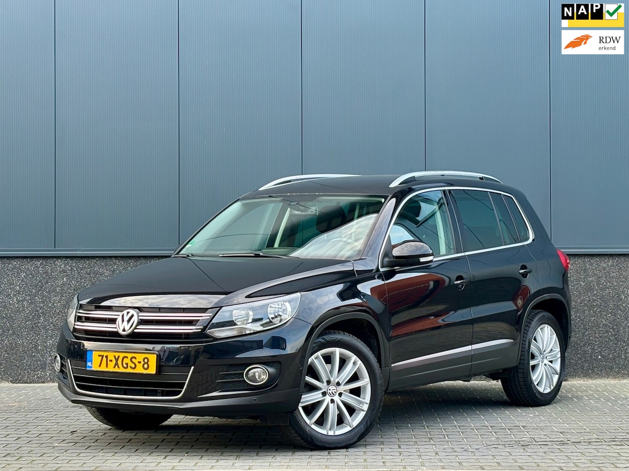 Volkswagen Tiguan - 1.4 TSI Sport&Style Navigatie | Cruise | Clima - AutoWereld.nl
