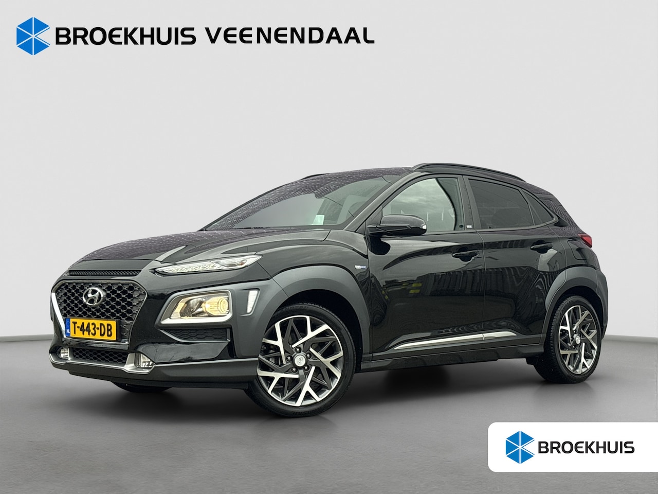 Hyundai Kona - 1.6 GDI HEV Premium | Leder | Trekhaak | HUD | Stoelverwarming | BLIS | Navigatie - AutoWereld.nl