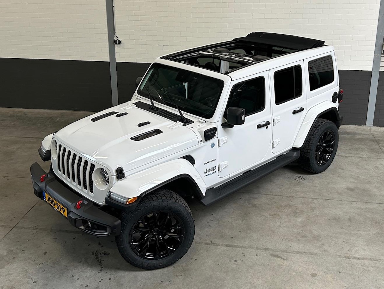 Jeep Wrangler Unlimited - 4xe cabrio, 20 inch, Apple - Android ect. - AutoWereld.nl