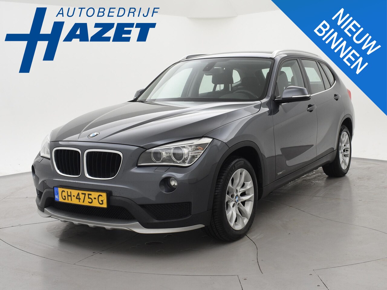 BMW X1 - sDrive20i 184 PK AUT. ORIG. NL *94.700 KM* + TREKHAAK | NAVI PRO | MINERALGRAU - AutoWereld.nl
