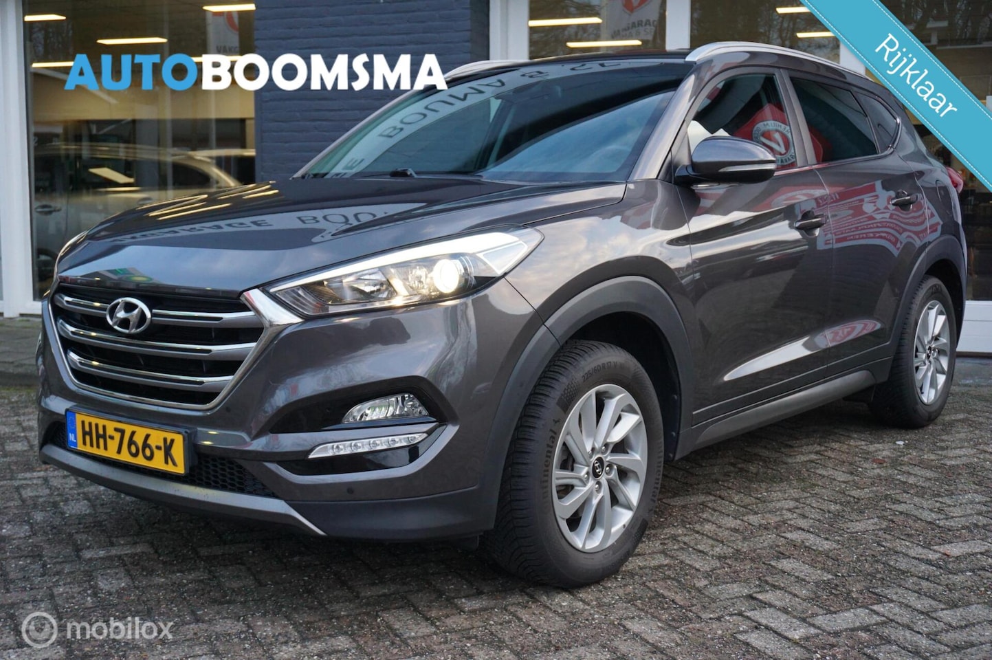 Hyundai Tucson - 1.6 GDi 132pk i-Motion Clima Cruise Navi 2xPDC - AutoWereld.nl