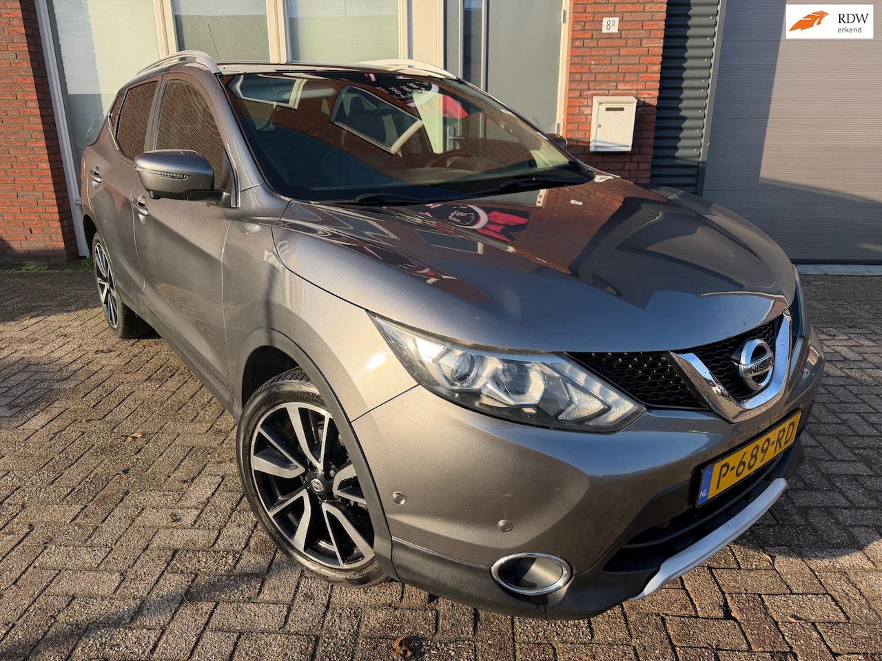 Nissan Qashqai - 1.2 Tekna / Pano / Navi / Cruise / Trekhaak - AutoWereld.nl