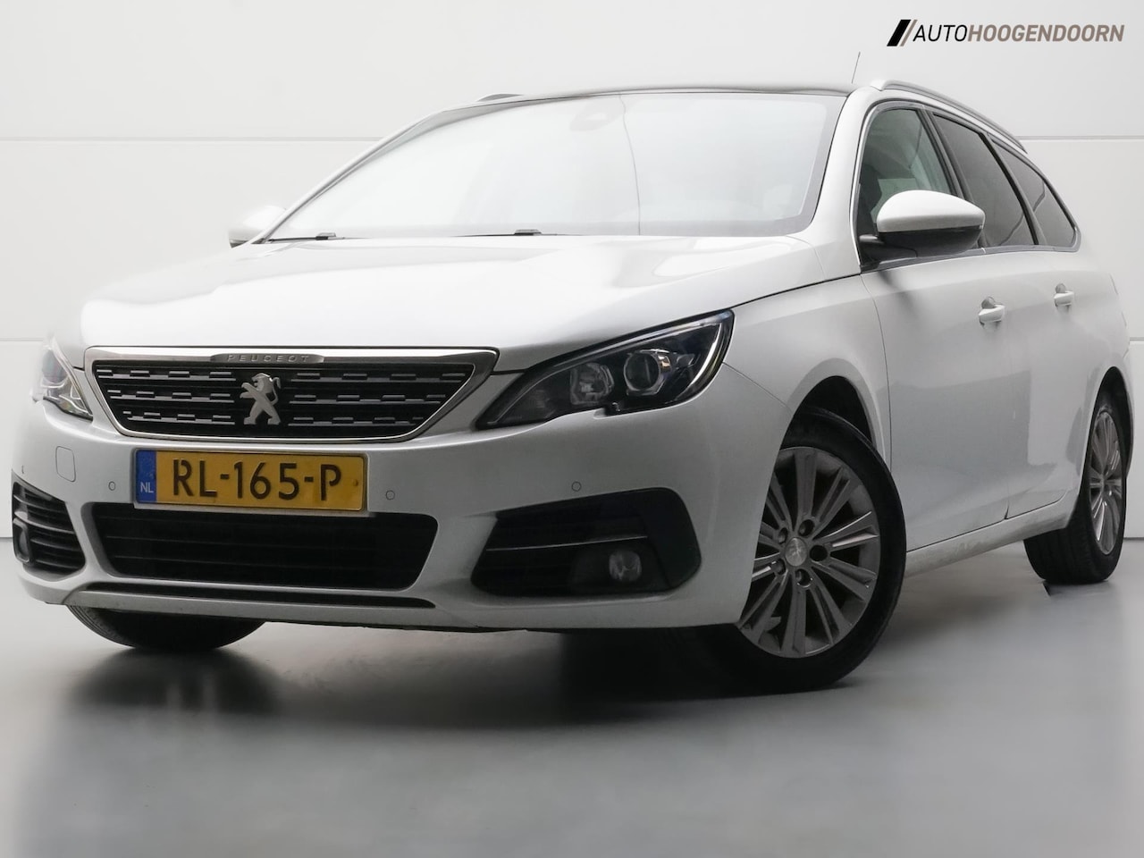 Peugeot 308 SW - 1.2 PureTech Premium 130pk (PANORAMADAK,SPORTSTOELEN,PARELMOER,CAMERA,CRUISE,LEDER,APPLE C - AutoWereld.nl